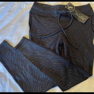 Celestial Bodiez black Zebra striped leggings with pockets and draw string